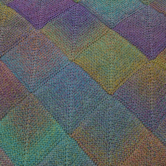 

Strikket Dream Colour domino sjal
2