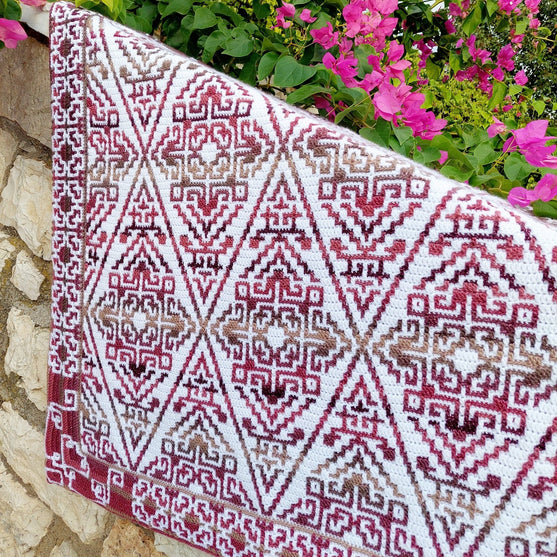 

Aztecana - Mosaikhæklet tæppe
4