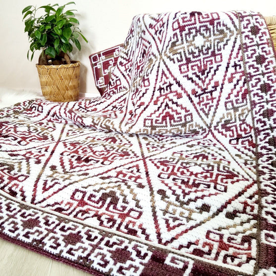 

Aztecana - Mosaikhæklet tæppe
3