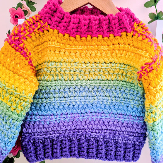 

Cosy Rainbow Jumper - Børnesweater
3
