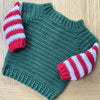 

Baby Elf - Julesweater og -hue
5
