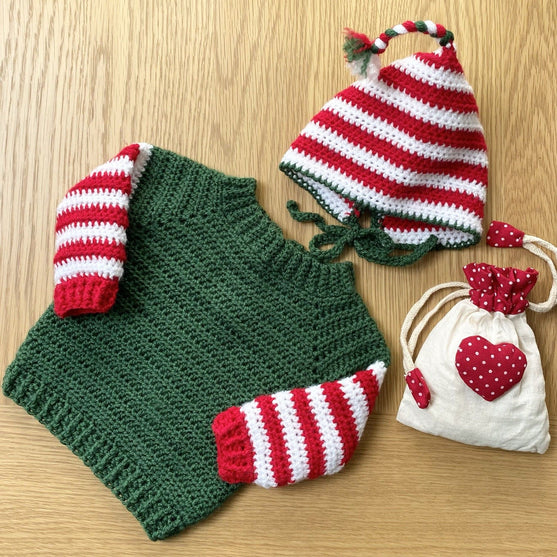 

Baby Elf - Julesweater og -hue
1