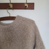 

Suri - Sweater
12