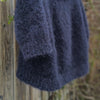 

Suri - Sweater
5
