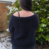 

Suri - Sweater
4