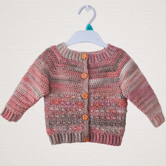 

Coral - Børnecardigan
4