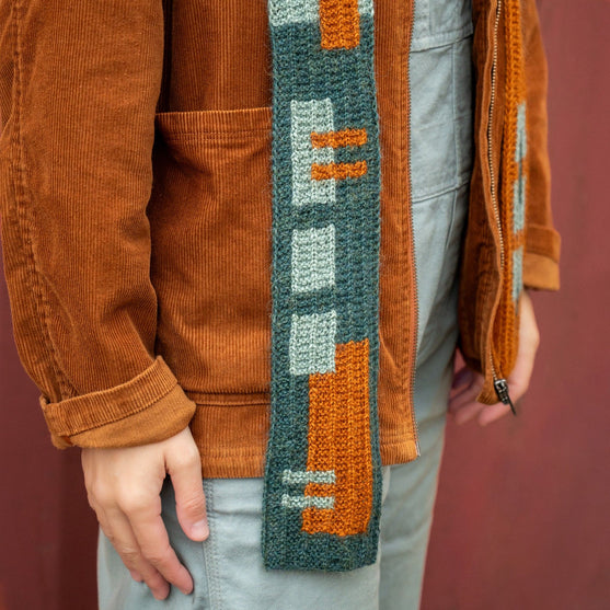 

Rust & Rhythm - Hættetørklæde
4