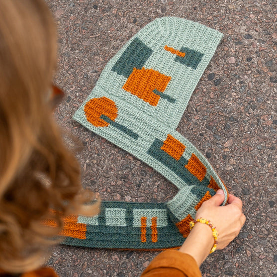 

Rust & Rhythm - Hættetørklæde
3